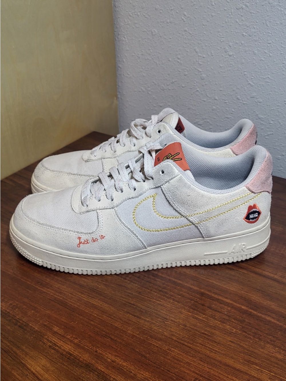 Nike White Low-Top Sneakers with Pink & Yellow Accents